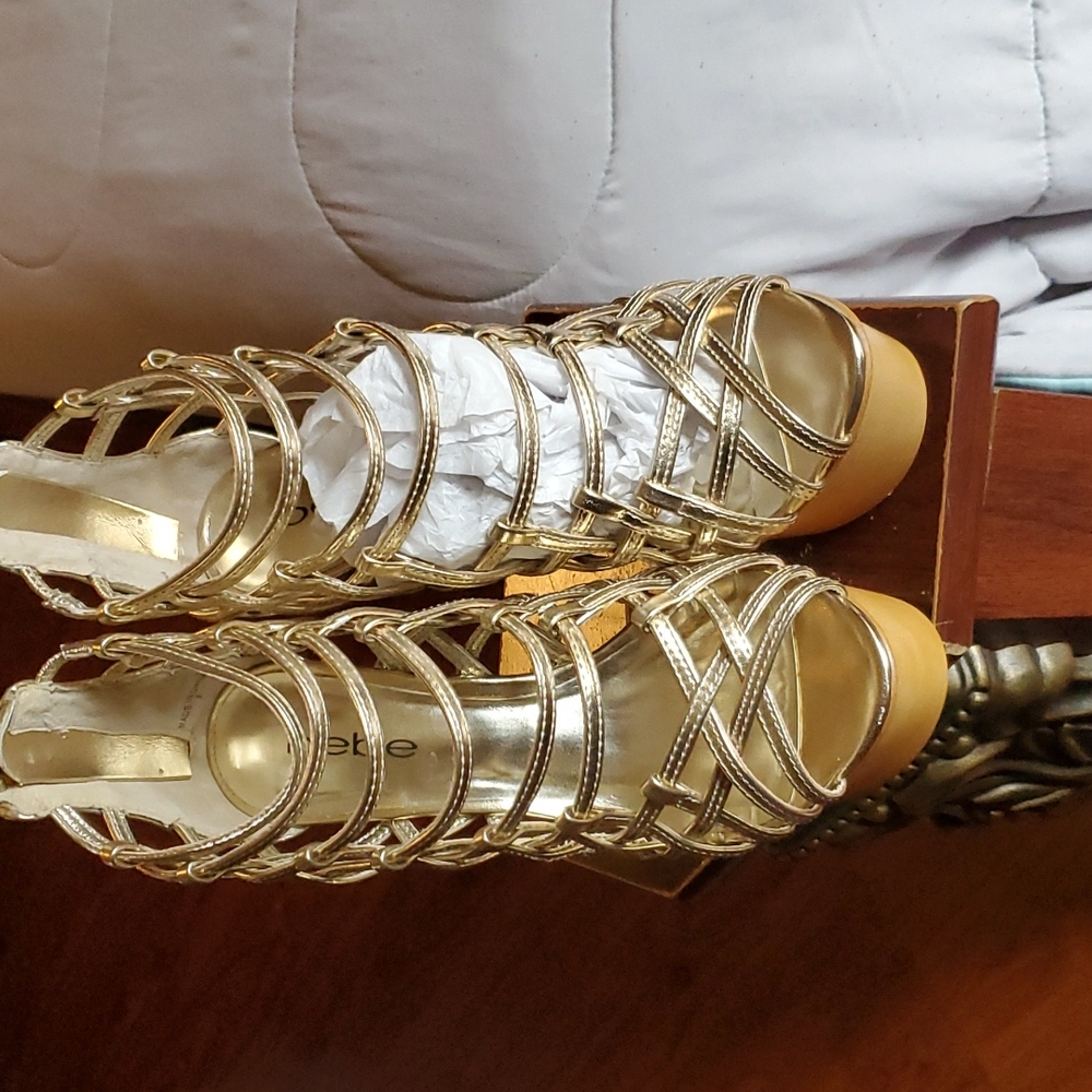 beautiful  gold  wedges  in gold  from Bebe size 7